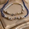 Infinity Couple Rakhi Set with Pearl Beads, Evil Eye Charm and Blue Thread